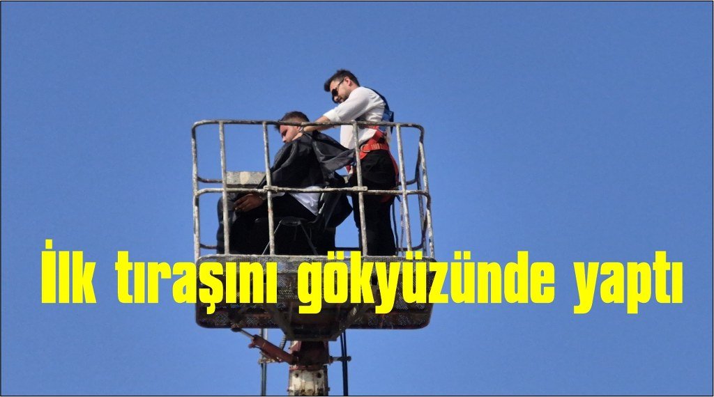 Yeni açtığı dükkanının ilk tıraşını gökyüzünde yaptı