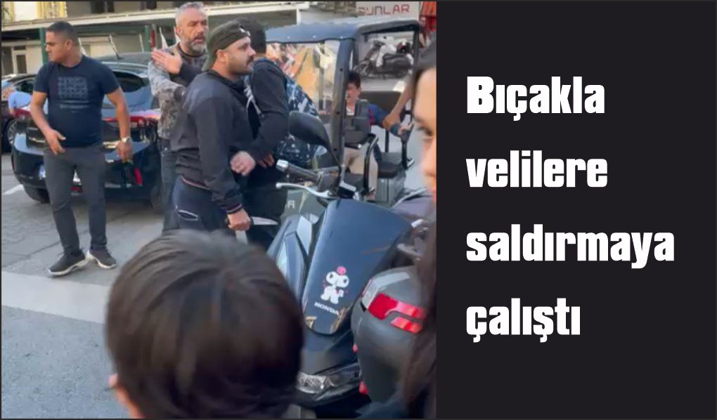 Çocuğunun gözü önünde velilere bıçakla saldırmaya çalıştı